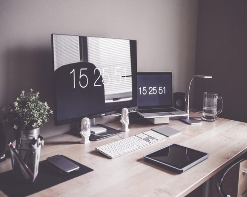 Ergonomic workspace setup with a laptop and comfortable chair
