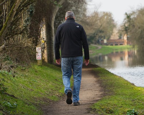 Person taking a walk outside after work