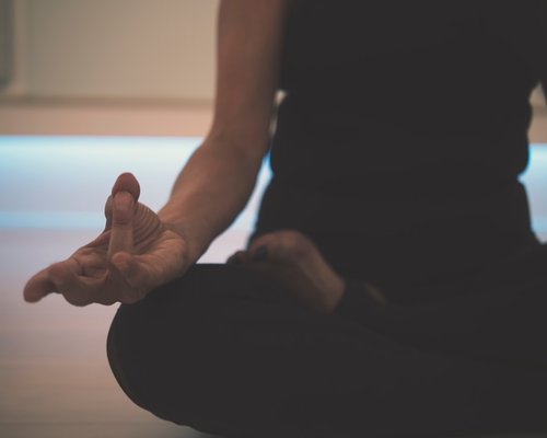 Close up of hands resting during meditation